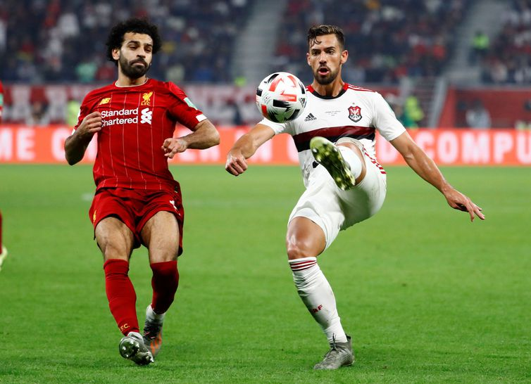 Soccer Football - Club World Cup - Final - Liverpool v Flamengo - Khalifa International Stadium, Doha, Qatar - December 21, 2019  Flamengo's Pablo Mari in action with Liverpool's Mohamed Salah   REUTERS/Kai Pfaffenbach